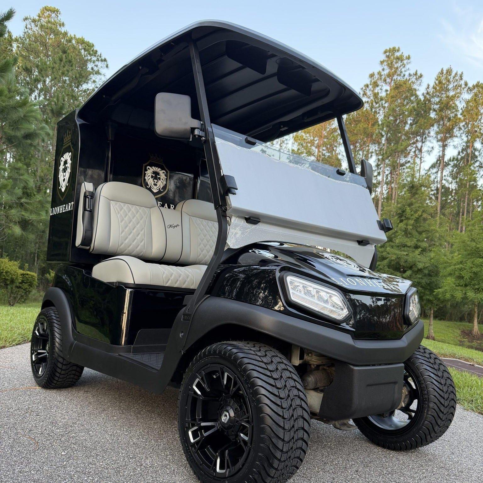 Lionheart Country Club build, front three quarter with diamond stitched seats