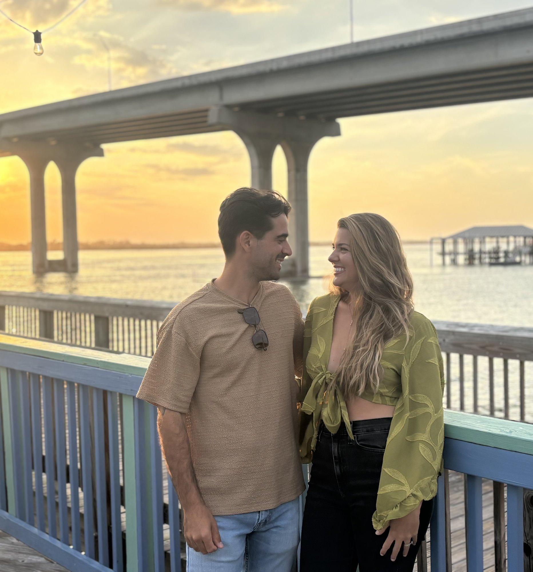 Hannah and Carlos Lopez at golden hour on the water in St. Augustine