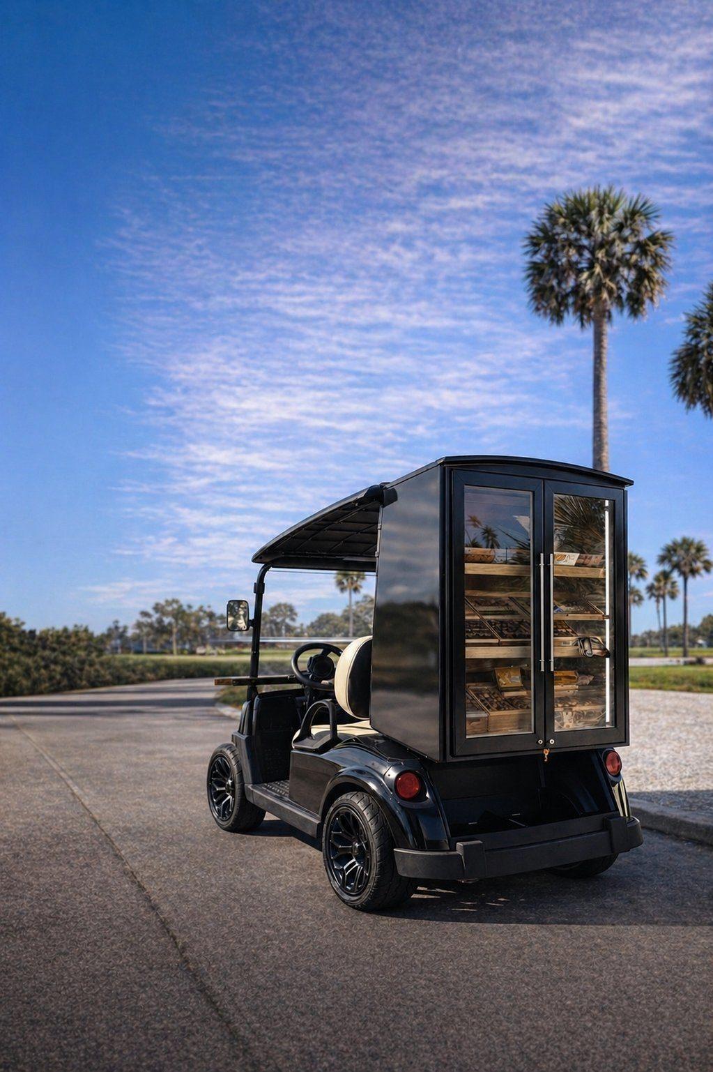 Fire and Ash cigar cart on a palm lined drive